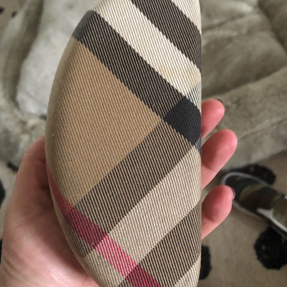 Burberry sunglasses case.